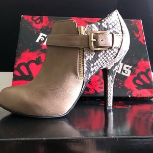 Stylish Faux-leather booties.